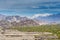 Beautiful landscape with fields of delta of Indus River, Tibetian buildings, Himalayas snow mountains, and blue sky,  in Ladakh,