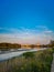 Beautiful landscape with flying paratrooper above the river in Wroclaw city