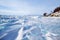 Beautiful landscape of the frozen Lake Baikal. Fields of ice hummocks near the shore in the village of Listvyanka.