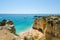 Beautiful landscape with golden limestone cliffs, Atlantic ocean and the Rabbit Beach (Praia da Coelha) in Albufeira