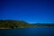 Beautiful landscape with gorgeous blue sky in a sunny day seen from ferry from north island to south island, in New