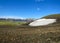 Beautiful landscape of green Hvanngil valley and rhyolite mountains covered with snow, Laugavegur Trail, Highland of Iceland