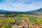 Beautiful landscape with Gruyeres city , fields and mountains, S