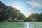 Beautiful landscape of Halong Bay with sunshine over the limestone mountain in Vietnam.