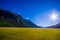 Beautiful landscape of high mountain glacier at milford sound with a sunshine in the sky, in south island in New Zealand