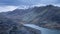 Beautiful landscape image of Dinorwig Slate Mine and snowcapped Snowdon mountain in background during Winter in Snowdonia with