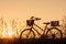 Beautiful landscape image with Silhouette vintage Bicycle at sunset.classic bicycle, for greeting Cards ,post card