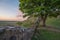 Beautiful landscape image of Sycamore Gap at Hadrian`s Wall in N