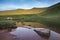 Beautiful landscape image of wild camping at base of Pen-y-fan i