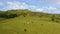 Beautiful landscape on the island of Luzon, aerial view. Green hills and mountains. Green hills and blue sky with clouds