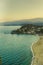 Beautiful landscape of italian seascape. Mediterranean sea south italy. Gulf with turquoise sea, rocks and beach. Mountains backgr