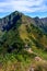 Beautiful landscape, Khao Chang Phuak Mountain with golden grass field and blue sky