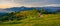 Beautiful landscape mountain hill meadow sunrise morning village Bucovina Romania