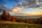 Beautiful landscape mountain hill meadow sunrise morning village Romania