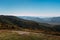 Beautiful landscape of a mountain ridge and a blue sky in the summer season. Marcothsky Range, Gelendzhik, Russia