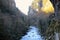 Beautiful landscape of mountain river in forest. Bright panorama of violent river between stones in spring