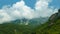 beautiful landscape in the mountains of Montenegro, the movement of clouds, a bright sunny day, a forest on the hillsides