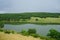 Beautiful landscape in nature and a dam with a boat in it. Asenovgrad, Plovdiv region, Europe, Bulgaria