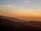 Beautiful landscape in Niha , the lebanese village with black mountains silhouettes and orange sky