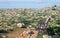 Beautiful Landscape with a old, lonely bank on Dingli Cliffs in a field of stones.