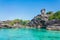 Beautiful landscape people on rock is a symbol of Similan Islands, blue sky and cloud over the sea during summer at Mu Ko Similan