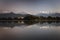 Beautiful landscape with Phewa Lake and mountains in background also as reflectaion on lake.  Machapuchare-FIshtail, Annapurna and