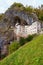 Beautiful landscape photo of Predjama castle Predjamski grad. Renaissance castle built within a cave mouth.