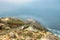 Beautiful landscape, Point Reyes lighthouse on the rocky coast of the Pacific Ocean, a long staircase leads to it