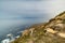 Beautiful landscape, Point Reyes lighthouse on the rocky coast of the Pacific Ocean, a long staircase leads to it