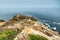 Beautiful landscape, Point Reyes lighthouse on the rocky coast of the Pacific Ocean, a long staircase leads to it