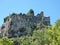 Beautiful landscape with the ruined castle which overlooks the village of Fontaine de Vaucluse in Provence