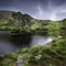 Beautiful landscape of Scotland ,UK.Small island with pine trees on the middle of lake