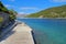 Beautiful landscape of sea Coast of Adriatic sea with a promenade and transparent blue water in Pucisca, Croatia. Island of Brac