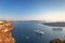 Beautiful landscape with sea view on the Sunset. Cruise liner in the Aegean Sea, Thira, Santorini island, Greece. Summer seascape