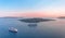 Beautiful landscape with sea view on the Sunset. Cruise liner in the Aegean Sea, Thira, Santorini island, Greece. Summer seascape