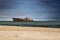 Beautiful landscape with a shipwreck at sea. Abandoned wreck