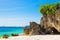 Beautiful landscape of tropical beach, rocks with vegetation, se