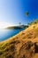 Beautiful Landscape and Tropical over the blue sea and Cape with sailboat in the background and rock cape foreground and the sunli