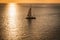 Beautiful Landscape and Tropical. Yacht or Sailboat over the sea sunset with the sunlight reflection on the water.