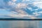 Beautiful landscape with turquoise lake, reflection of blue sky and wild mountains. Relaxing paradise background. Tranquility.