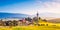 Beautiful landscape of valley in Slovakia mountains, small houses in village, rural scene. Spissky Stvrtok, Slovakia