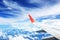 Beautiful landscape view background of sky above cloud  plane`s window and see plane`s wing