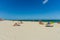 Beautiful landscape view of Miami South  Beach coast line. Sand beach, Atlantic Ocean, people  on blue sky background. USA.