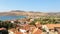 Beautiful Landscape View of Mountains,Sea,Trees,Rooftops From The Top Of The Hill on Sunny Summer Day