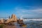 Beautiful landscape with view of ocean, perfect beach, big stones, trees, azure water. Background image. Concept travel