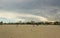 Beautiful landscape view of sunset Miami South  Beach coast line. Sand beach, Atlantic Ocean, people  on blue sky background.