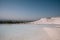 beautiful landscape with white rocks and calm water of pool