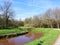 Beautiful landscape with winding river \\\'Grote Nete\\\' along a hiking route in Westerlo in Belgium.