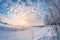 Beautiful landscape, winter rural road at sunset, fisheye distortion