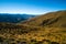 Beautiful landscape of a yellow grassland blue sky and Alps mountain at sunset. I